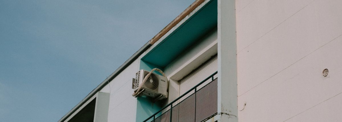 How can low refrigerant affect air conditioning performance?