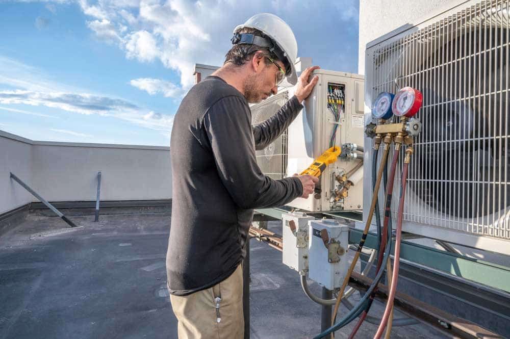 Faulty heating system being repaired Faulty heating system being repaired