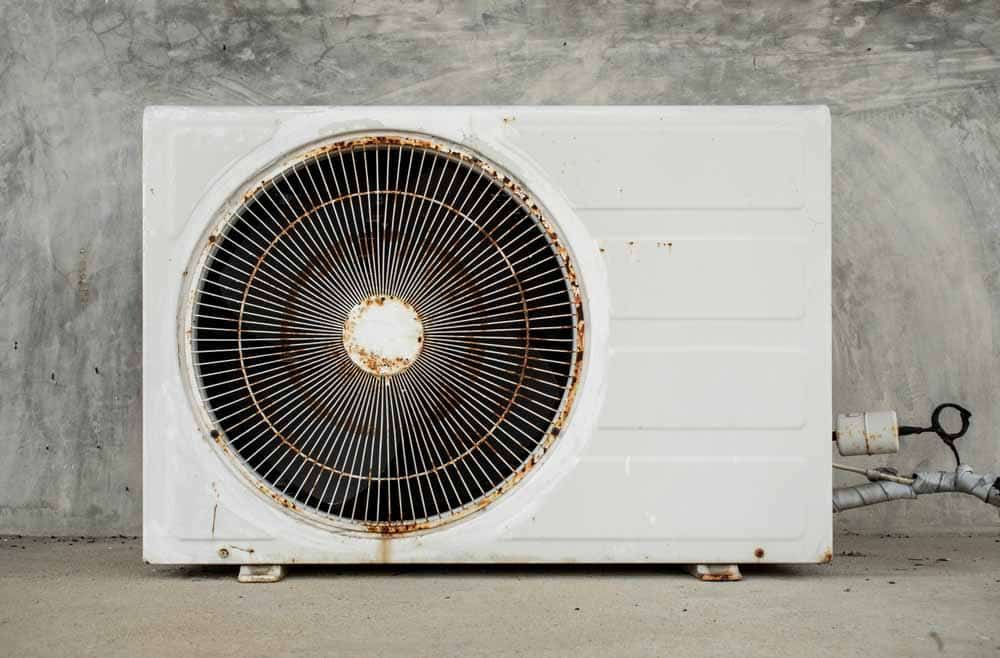 Old, worn-out AC unit in Tulsa, OK Old, worn-out AC unit in Tulsa, OK