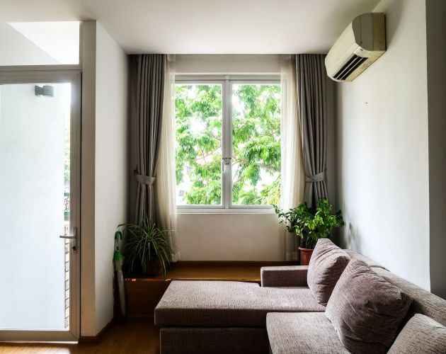 Ductless mini-split unit mounted on an interior wall
