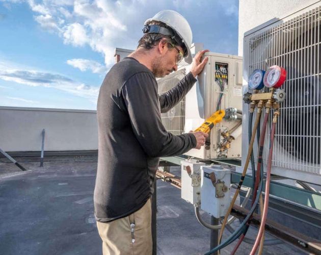 Faulty heating system being repaired