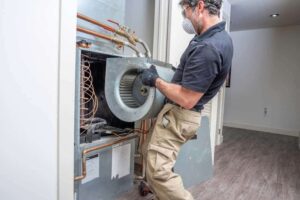 HVAC contractor repairing heat pumps in Bixby, OK
